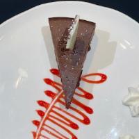 Flourless Chocolate Torte · raspberry coulis, white chocolate