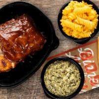 Baby Back Ribs with Rotisserie Chicken · Slow-cooked, fall-off-the-bone baby back ribs seasoned then brushed with hickory-smoked BBQ ...