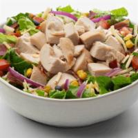 Southwest Cobb Salad · No cowboy boots required to enjoy this mouth-watering mix of romaine and leaf lettuce with r...