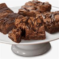 Indulgent Chocolate Brownie - Family Size · Traditional chocolate decadence  with chocolate chips bits throughout and striped on top.