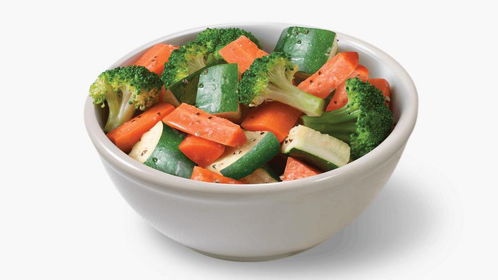 Fresh Steamed Vegetables · Is it us, or are things getting steamy in here? Our fresh broccoli, carrots, and zucchini are tossed in the perfect amount of olive oil, salt, and pepper then steamed to perfection. Don’t be shy, dig in.
