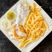 Chicken Gyro · Grilled chicken gyro served with the veggie mix, romaine lettuce, tzatziki, and chutney sauc...