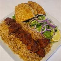 Tika Kabob  · Beef Tri -Trip cooked over open flame. Marinated for over 48 hours to lock in juices and fla...