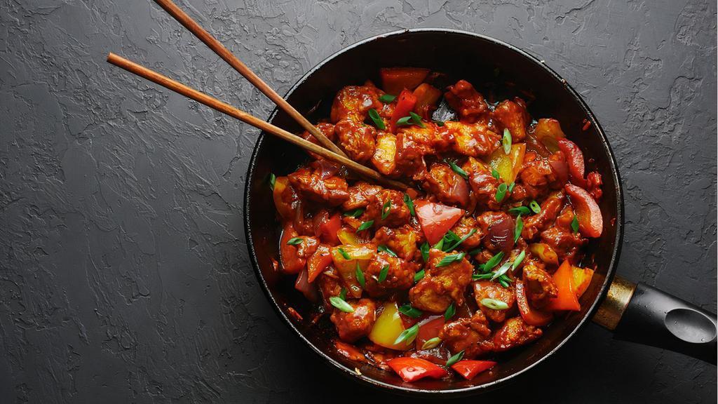Authentic Chicken Manchurian · Spicy chicken pieces steamed formed into deep fried dumplings