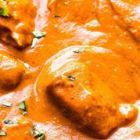 Creamy Butter Chicken Curry · Chunks of grilled chicken cooked in smooth buttery and creamy tomato based gravy.