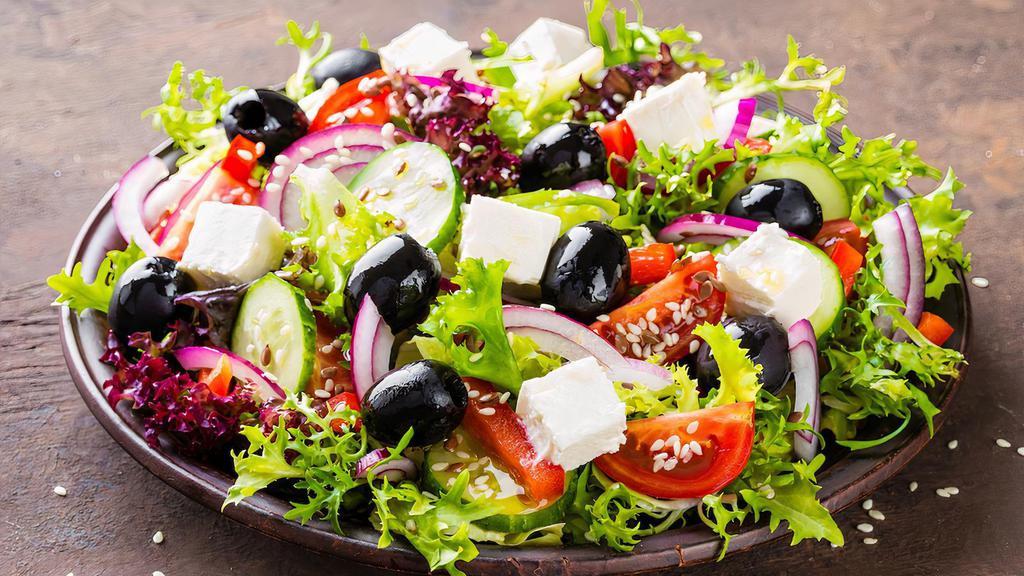 Greek Salad · Romaine hearts, tomatoes, cucumber, red onions, feta cheese.