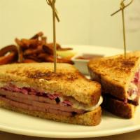 Roasted Beef Pastrami Sandwich · house made sauerkraut ,1000 island spread, Monterey Jack Cheese, whole wheat bread
