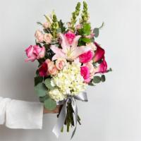 Pleasantly Pink Medium Bouquet · Roses, mini callas, spray roses, snap dragons, lilies, hydrangeas, fillers and greens.