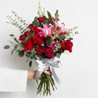 Rosey Red Medium Bouquet · Roses, double lilies, spray roses, snapdragons, fillers and greens.
