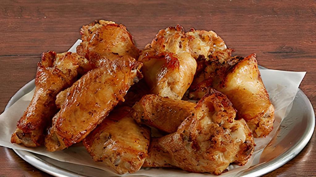 Classic Wings -12 Pieces · Classic Bone-In Oven Roasted Wings in your choice of four flavorful sauces - (50-70 cal./piece)