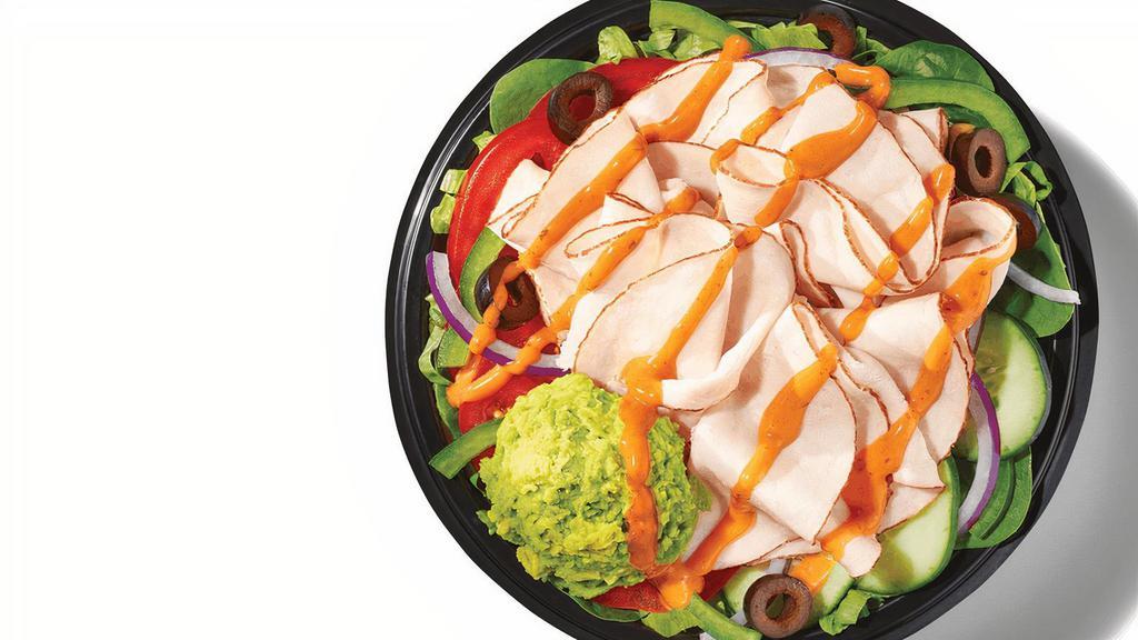 Baja Turkey Avocado (430 Cals) · Give your lunch a boost with a double portion of Oven-Roasted Turkey, along with Smashed Avocado and Baja Chipotle sauce on a bowl of greens and veggies.