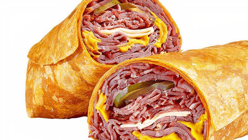 Big Hot Pastrami (860 Cals) · The Big Hot Pastrami wrap is just that. A generous helping of juicy pastrami with American cheese, pickles and, of course, mustard. Served in a Tomato Basil Wrap.