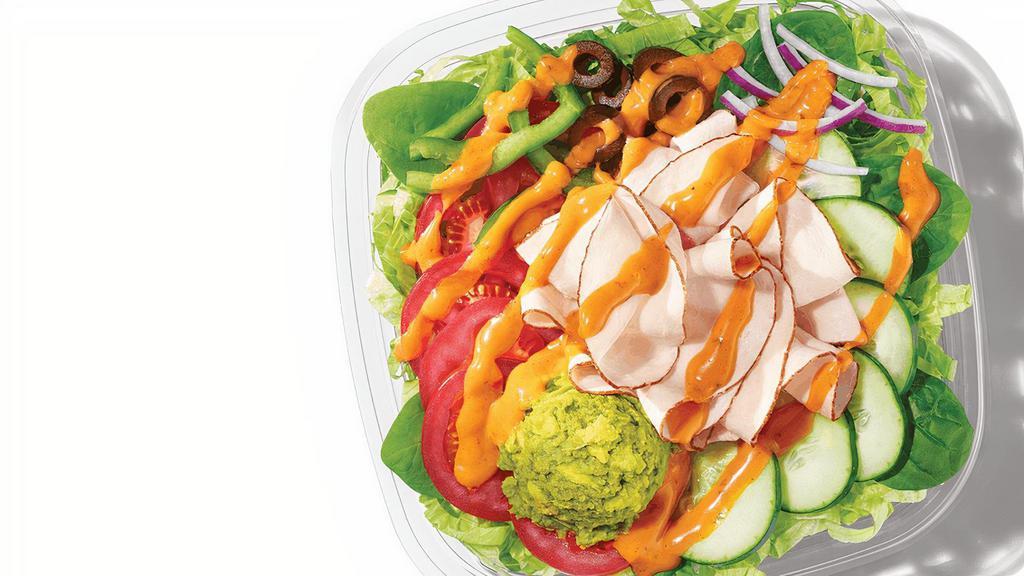 Baja Turkey Avocado (320 Cals) · Spice up your salad with Oven-Roasted Turkey, and Smashed Avocado, on a bed of greens and crisp veggies and topped with Baja Chipotle sauce.