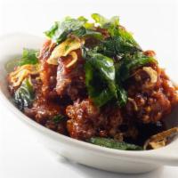 Mom's Wing · Fried chicken wings with sweet tamarind sauce topped with crispy shallot and basil.