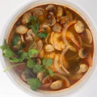 Bowl of Tom Yum Soup · Gluten free. Mild. Spicy and Sour soup with, lemongrass, kaffir lime leaves, galangal, tomat...
