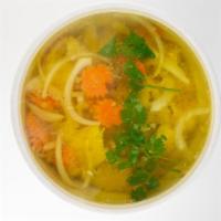 Cup of Turmeric Soup · Gluten free. Fresh turmeric broth flavored with lemongrass, garlic, shallot, onion, and carr...