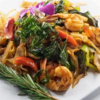 Pad Kee Mow · Medium spicy. Pan-fried flat noodles with garlic, chilies, bell peppers, tomatoes, onion and...
