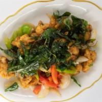 Spicy Basil · (NOT SERVED w/ Rice) (Medium spicy) Thai ground chili, garlic, onions, bell peppers, green b...