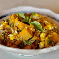 Golden Pumpkin · (NOT SERVED w/ Rice) Pumpkin with egg and basil leaves in garlic oyster sauce .