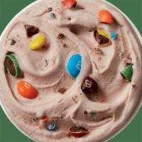 M&M’S® Milk Chocolate Candies Blizzard® Treat  · M&M's® candy pieces and chocolaty topping blended with creamy DQ® vanilla soft serve to BLIZ...