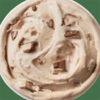 Snickers® Blizzard® · Snickers® pieces and chocolatey topping blended with creamy DQ® vanilla soft serve blended t...