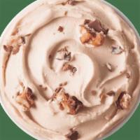 Snickers® Blizzard® Treat · SNICKERS® pieces and chocolaty topping blended with our world-famous vanilla soft serve to B...
