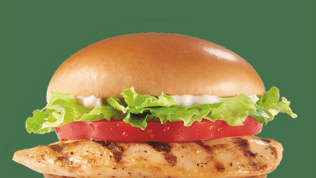 Grilled Chicken Sandwich · A grilled seasoned chicken fillet topped with crisp chopped lettuce, thick-cut tomato and mayo served on a warm toasted bun.