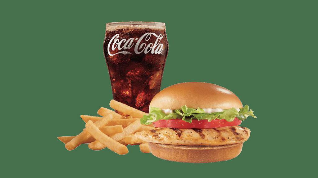 Grilled Chicken Sandwich Combo · A grilled seasoned chicken fillet topped with crisp chopped lettuce, thick-cut tomato and mayo served on a warm toasted bun. Served with fries and a 21oz drink.