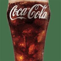 Soft Drink · A refreshing carbonated soft drink. Choice of Coke, Diet Coke, Sprite, Fanta Orange, Dr Pepp...