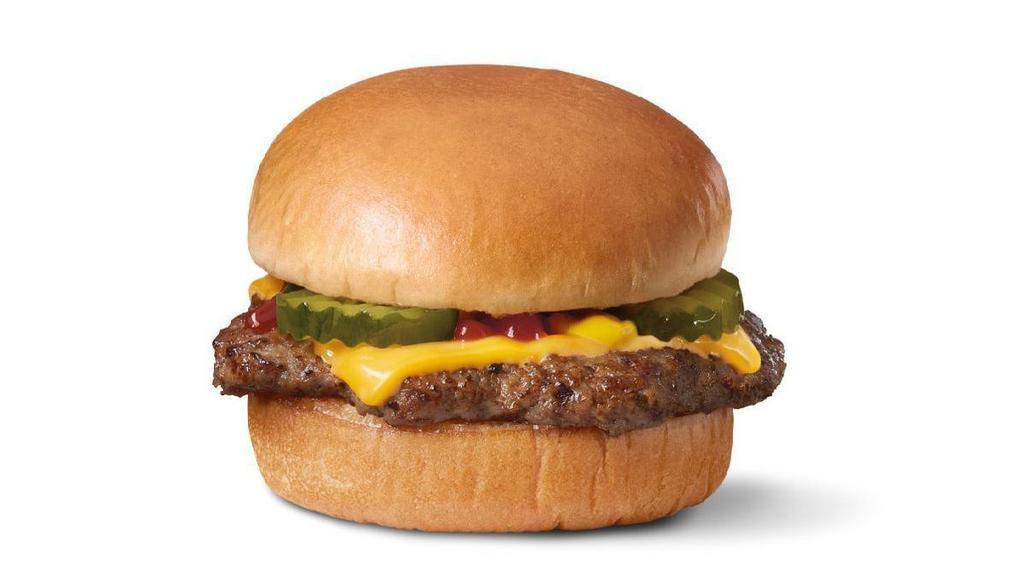 Original Cheeseburger · One 100% seasoned real beef patty topped with perfectly melted Sharp American Cheese**, pickles, ketchup, and mustard served on a soft and toasted bun.. **Pasteurized process
