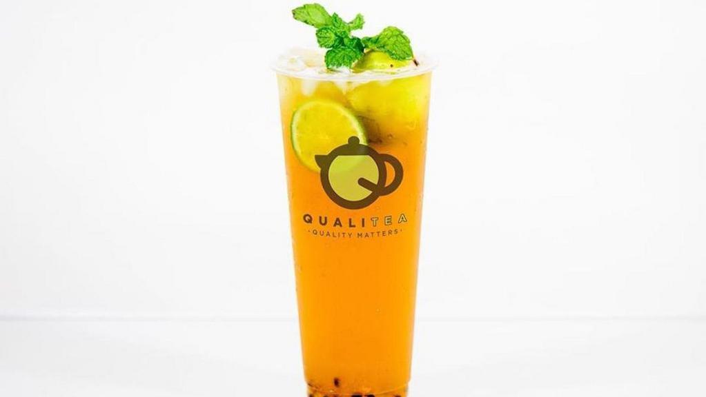 Passion Cooler · Passion fruit green tea with kumquat juice, limes and mint.