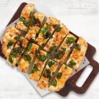 New Premium Shareable Cheesy Bread · Our house-made dough brushed with garlic butter and layer on mozzarella & cheddar cheese, an...