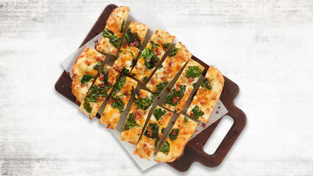 New Premium Shareable Cheesy Bread · Our house-made dough brushed with garlic butter and layer on mozzarella & cheddar cheese, and we sprinkle it with our Italian seasoning and served with your choice of sauce. Try our favorite topped with spinach & bacon or build your own – each topping just $.99