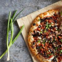 Beautiful Bacon · White sauce, cheese, ham, mushrooms, black olives, bacon and green onions.