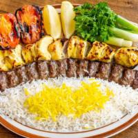 2 Entrée Combination Special · One skewer of koobideh and chicken kabob with grilled tomato and rice. Additional skewer of ...