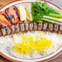 Koobideh · One skewer of marinated ground beef with a grilled tomato and Lavash Bread. 
*This item only...