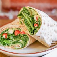 Hummus Wrap · Hummus spread with spinach, arugula, tomatoes, cucumber, red onions and feta cheese tossed i...