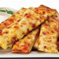 Cheezee Garlic Bread - Reg · A classic favorite! Signature creamy garlic sauce topped with mozzarella cheese and served w...