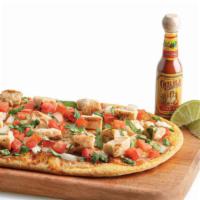 Street Taco Flatbread · Freshly baked flatbread made with taco sauce and seasoning, all-natural grilled chicken, and...