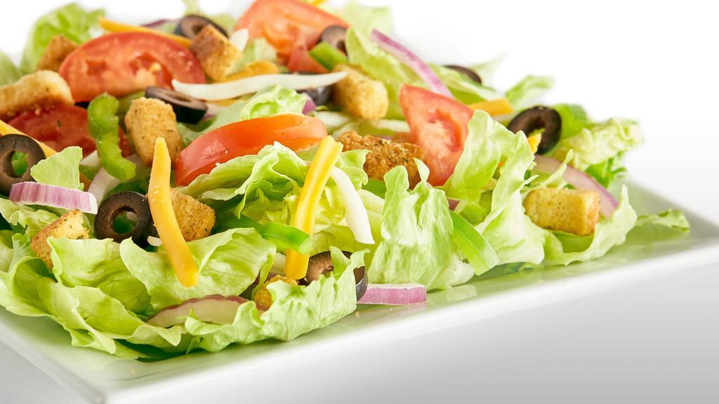 Garden Salad · Iceberg Lettuce, Bell Peppers, Red Onions, Black Olives, Fresh Roma Tomatoes, Mozzarella Cheese, Cheddar Cheese, Seasoned Croutons, and your choice of dressing.