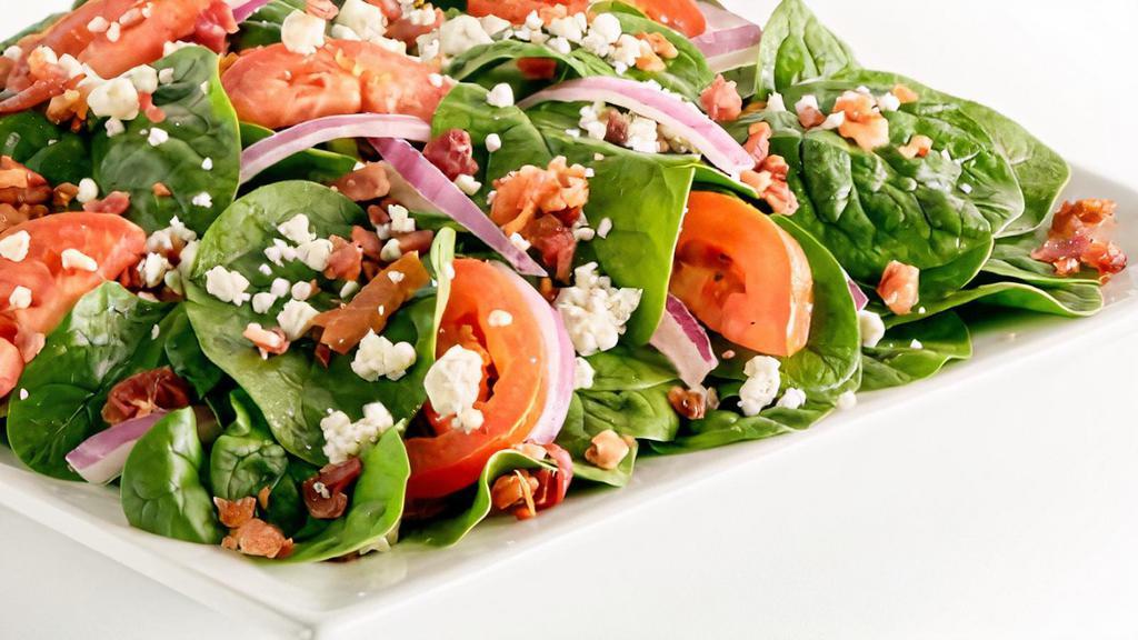 Spinach Tomato · Baby spinach, fresh Roma tomato, red onion, applewood-smoked bacon, gorgonzola cheese.