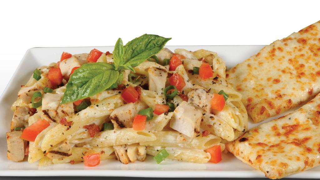 Penne Pollo Rustico Pasta · Penne Rigati, All-Natural Grilled Chicken, Smoked Bacon, Green Onions, Tomatoes, all tossed in our Creamy Garlic Sauce. Topped with Mozzarella Cheese, basil seasoning, and served with a personal garlic bread.