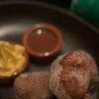 Churrodonas · ethereal churros with Mexican chocolate and passionfruit espuma. ***please allow 15-20 minut...