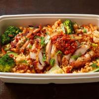 Hot Box It Box · Brown Rice, Sauce Tossed Vegetables, Crispy Shallots, Herbs, Jalapenos, Pickled Vegetables, ...