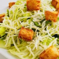 Caesar Salad (Half Size) · Romaine topped with shaved parmesan, house-made croutons & Caesar dressing