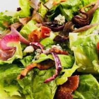 Bacon and Blue Salad (Half Size) · Romaine topped with bacon, gorgonzola, cherry tomatoes, caramelized red onion & house made b...