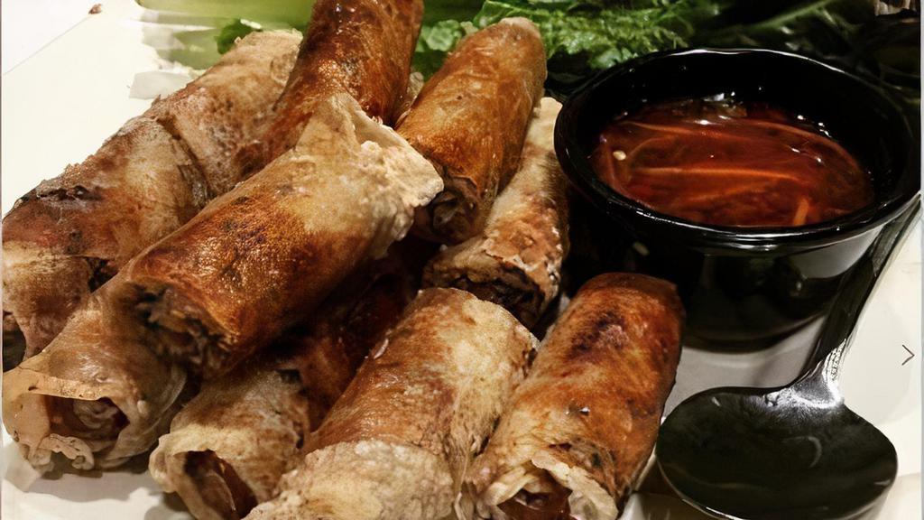 Imperial Rolls · Crispy rolls filled with pork, taro, carrots, and silver noodles.