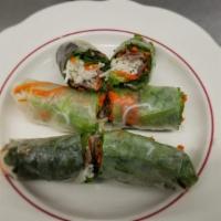 Grilled Pork Rolls · Soft rice paper rolls with charbroiled pork, lettuce, mint and vermicelli.