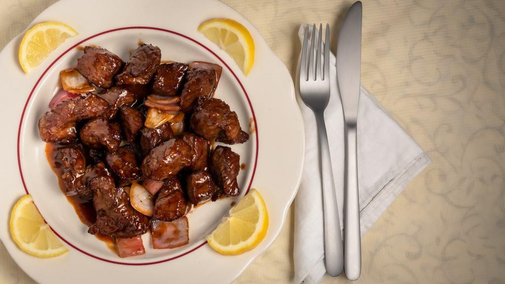 Beef Steak Cubes · Tender beef cubes sautéed with onions and a vinaigrette.