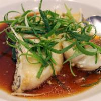 Steamed Sea Bass · Steak cut and steamed, served with a soy vinaigrette.